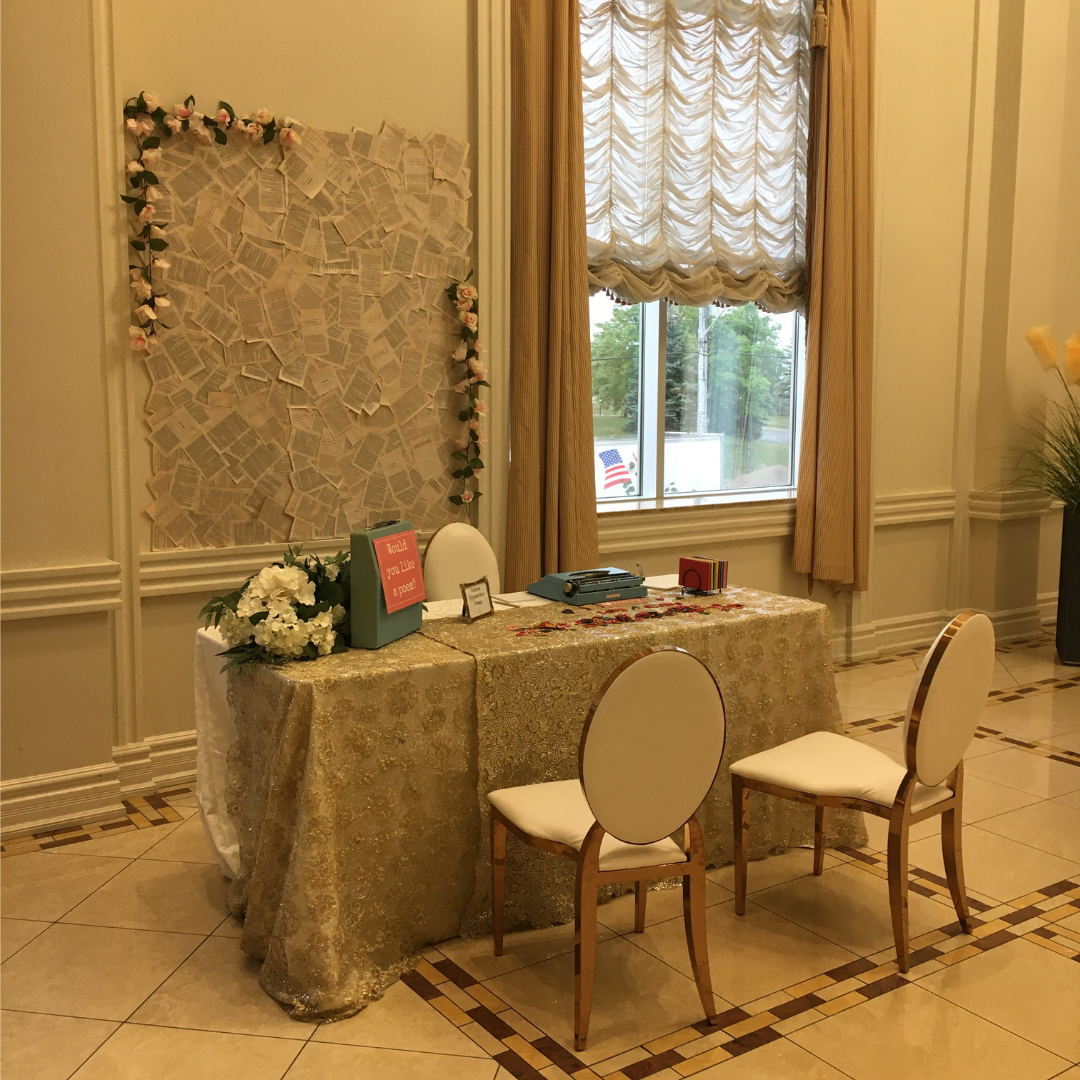 typewriter poetry backdrop at wedding, book theme
